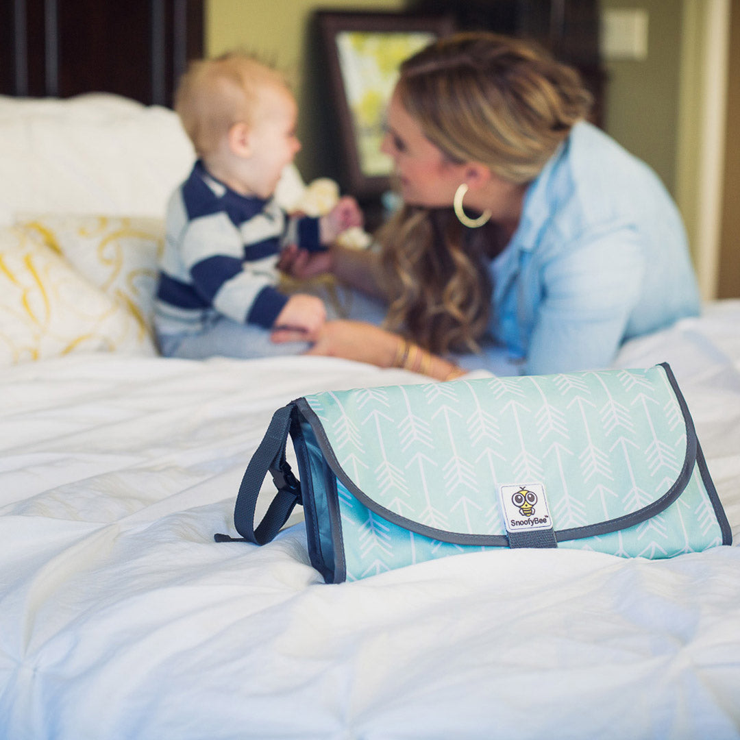 Hands free changing store pad